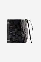 Black woven bucket bag with a strap on a white background