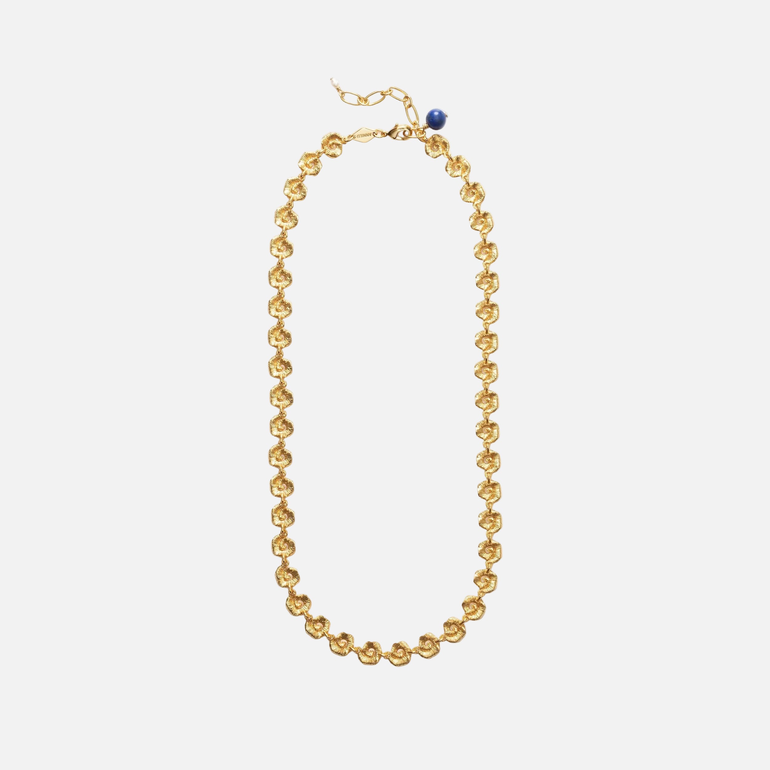 Gold necklace with a blue bead on a white background