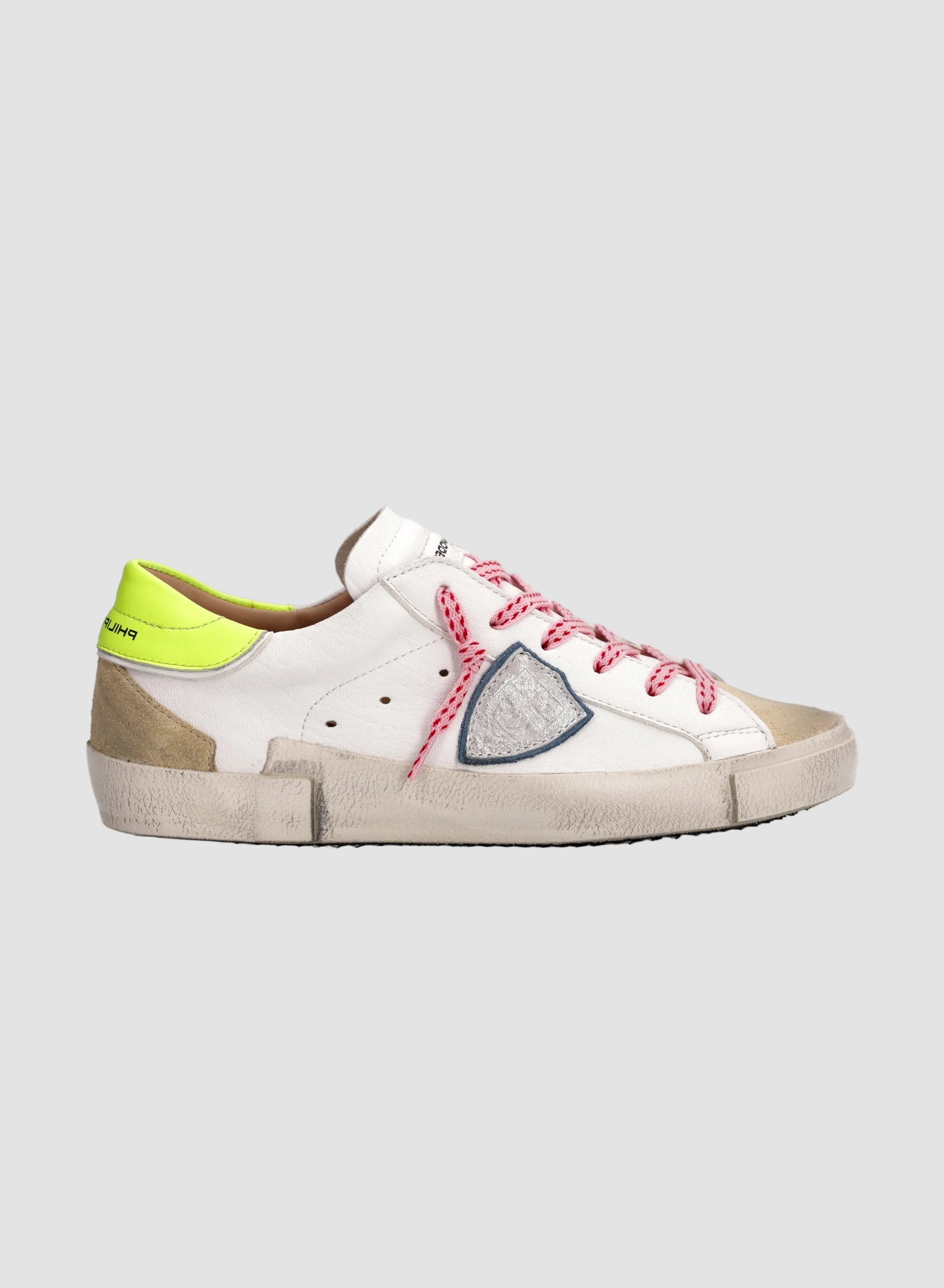 White sneaker with colorful accents on a white background