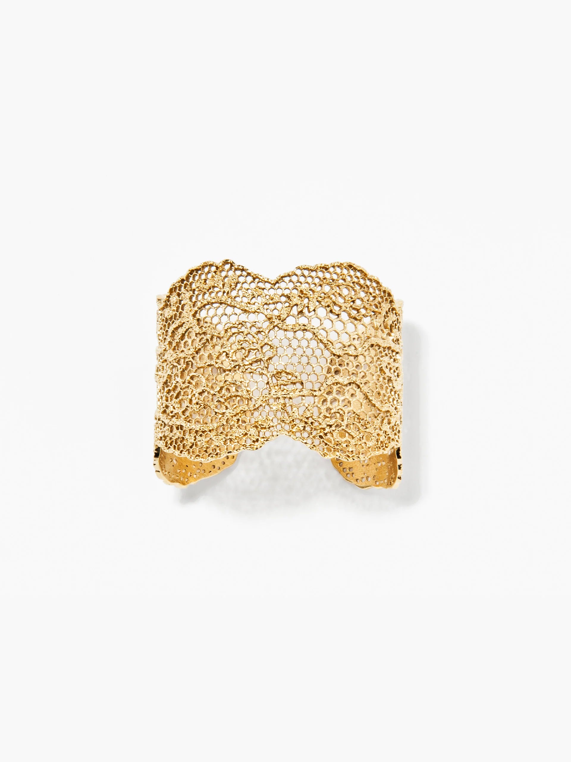 Gold lace cuff on a white background