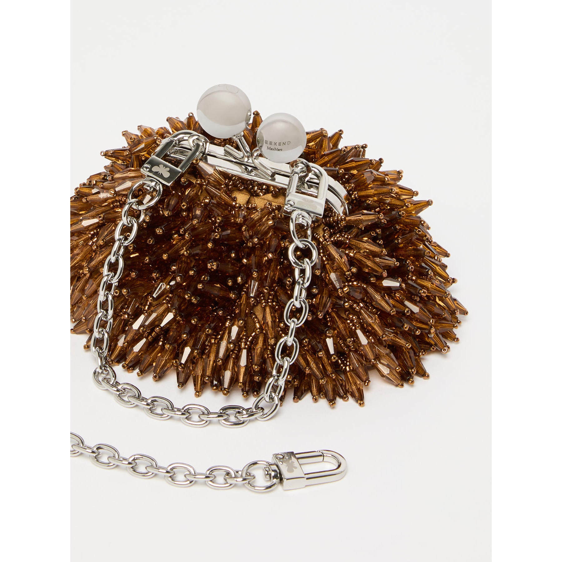 Brown textured handbag with silver chain and clasp on a white background