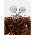 Close-up of a decorative clutch with gold beads and 'Weekend Maxmara' branding.