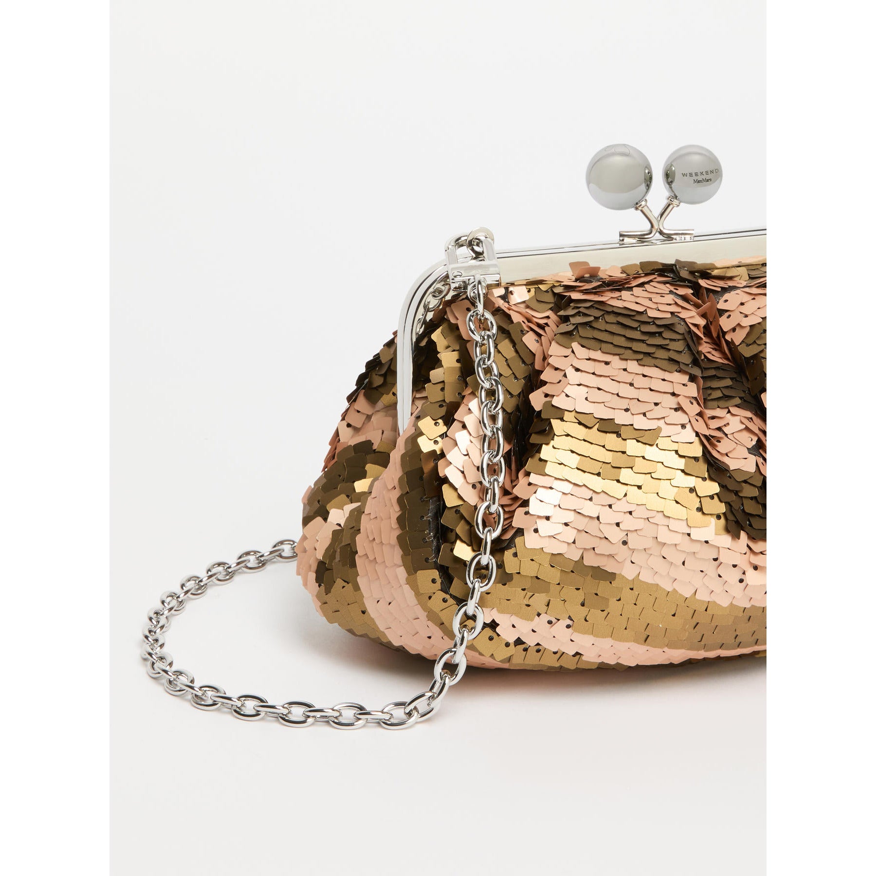 Gold and rose gold sequin clutch bag with a chain strap on a white background