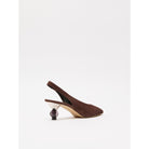 Brown suede slingback shoe with a small heel on a white background