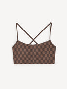 Brown patterned crop top with thin straps on a white background
